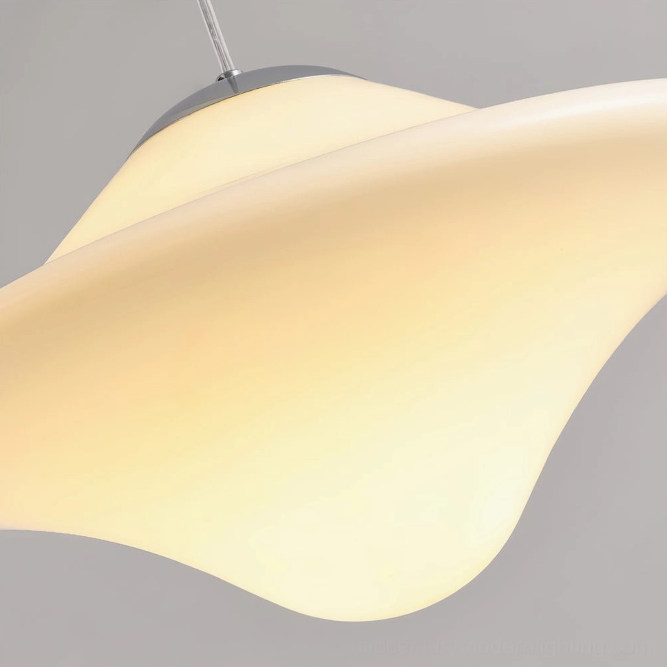 Close-up detail of opaline pendant lamp shade showing matte finish and backlit warm light