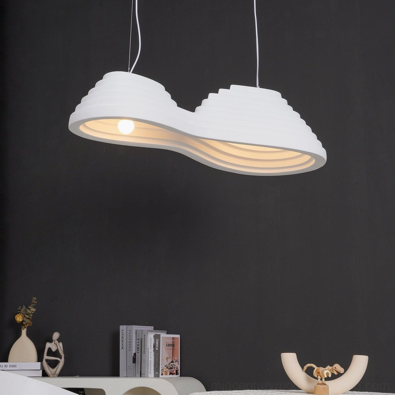 Organic layered pendant lamp casting beautiful shadows in warm home decor setting