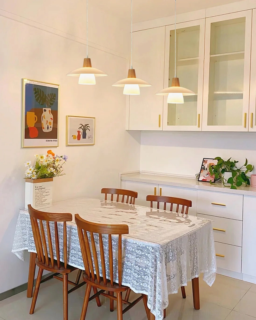 Size comparison of minimalist pendant lights displaying both diameter options available