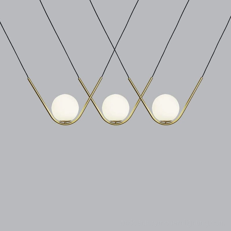 Perle three-head linear pendant light in brushed gold finish contemporary multi-globe fixture