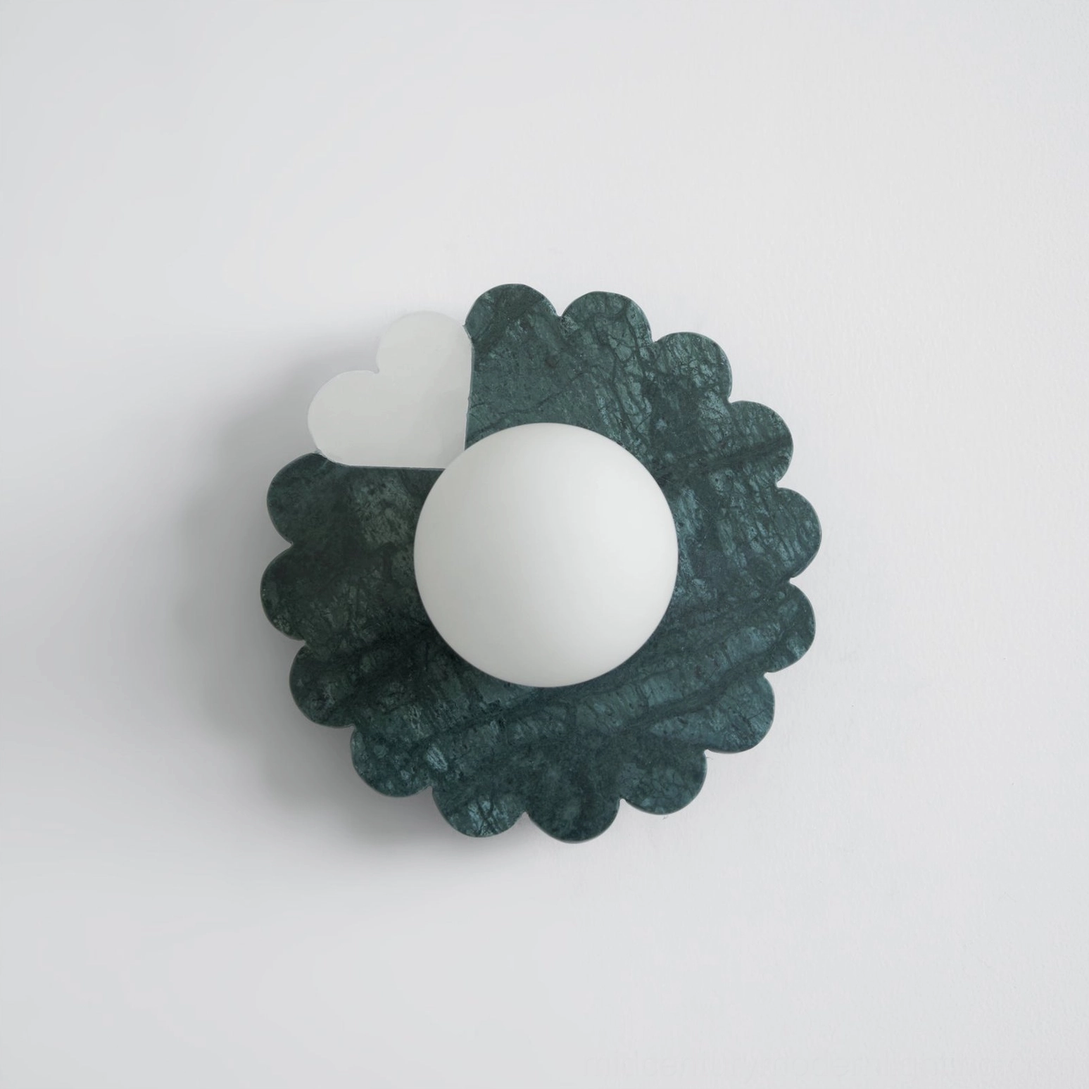 Forest green marble petal wall lamp with distinctive veining and organic curved design