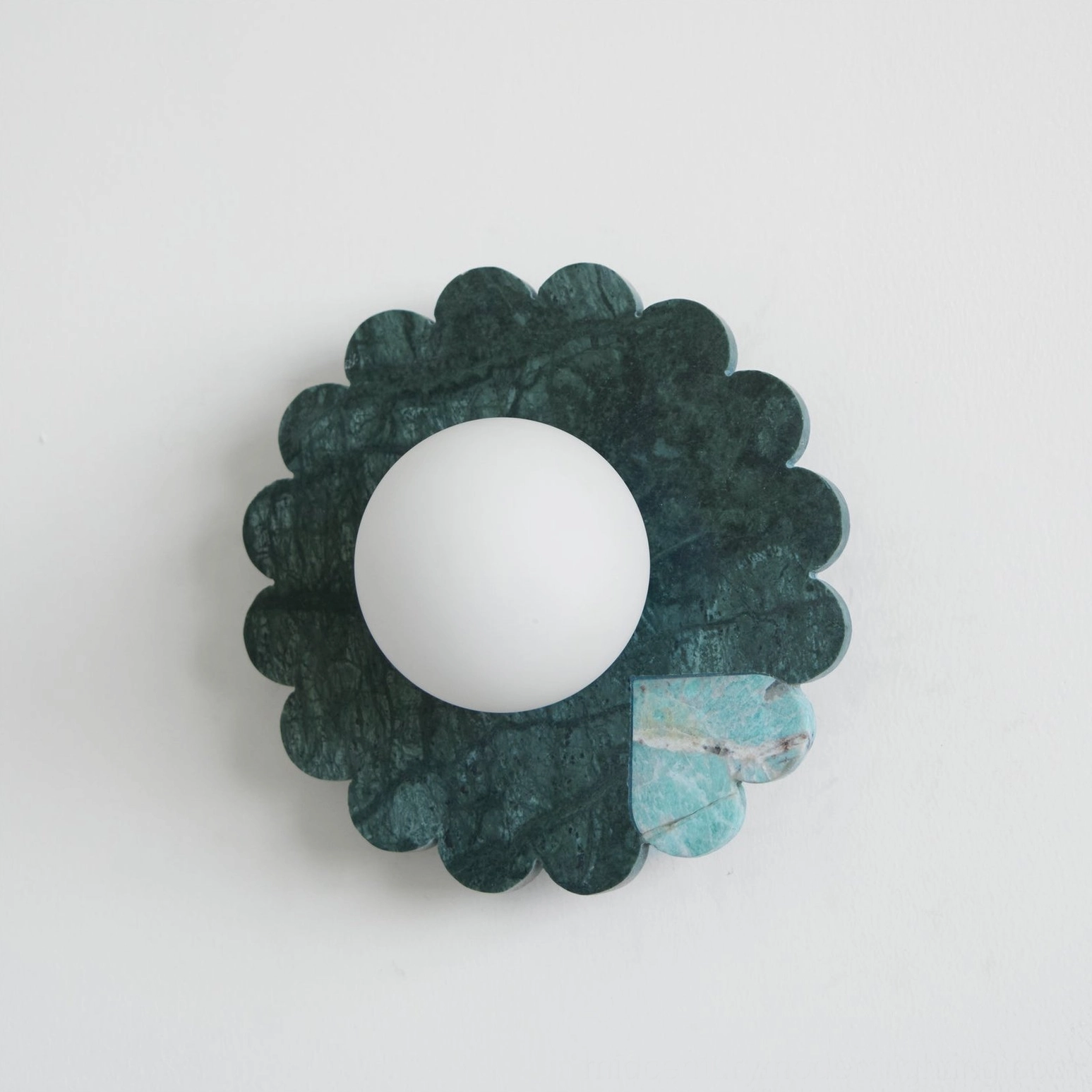 Green marble petal wall lamp overhead view showing organic scalloped petal design
