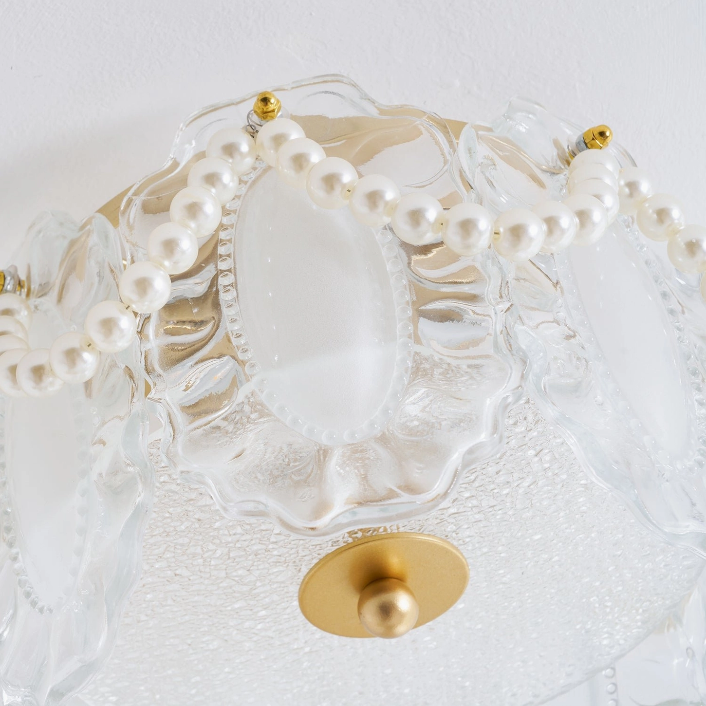 Petal Pearl flush mount light with brushed gold finish and opaque white glass shade