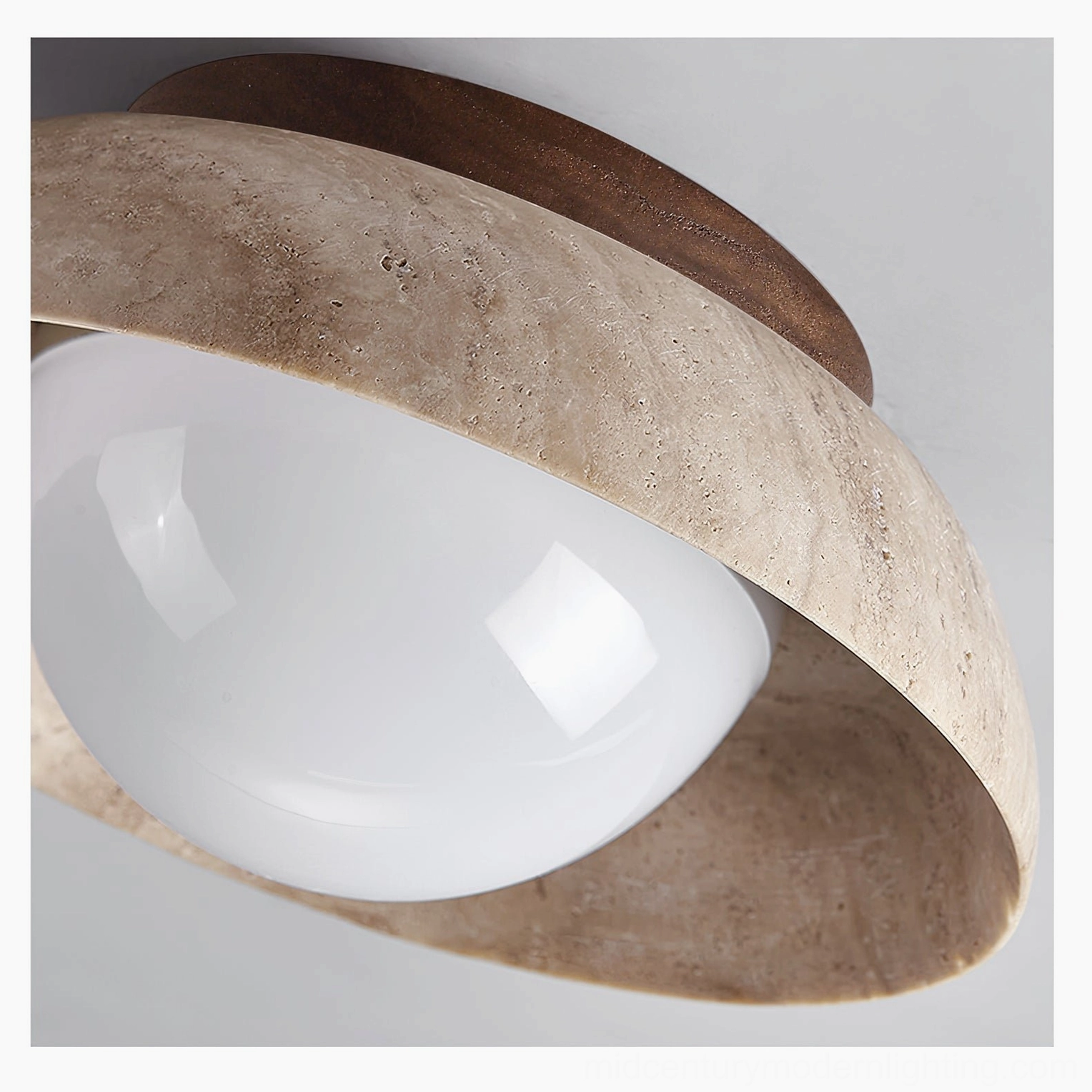 Extreme close-up of Piedra fixture detail showing exposed wood base and travertine stone shade craftsmanship