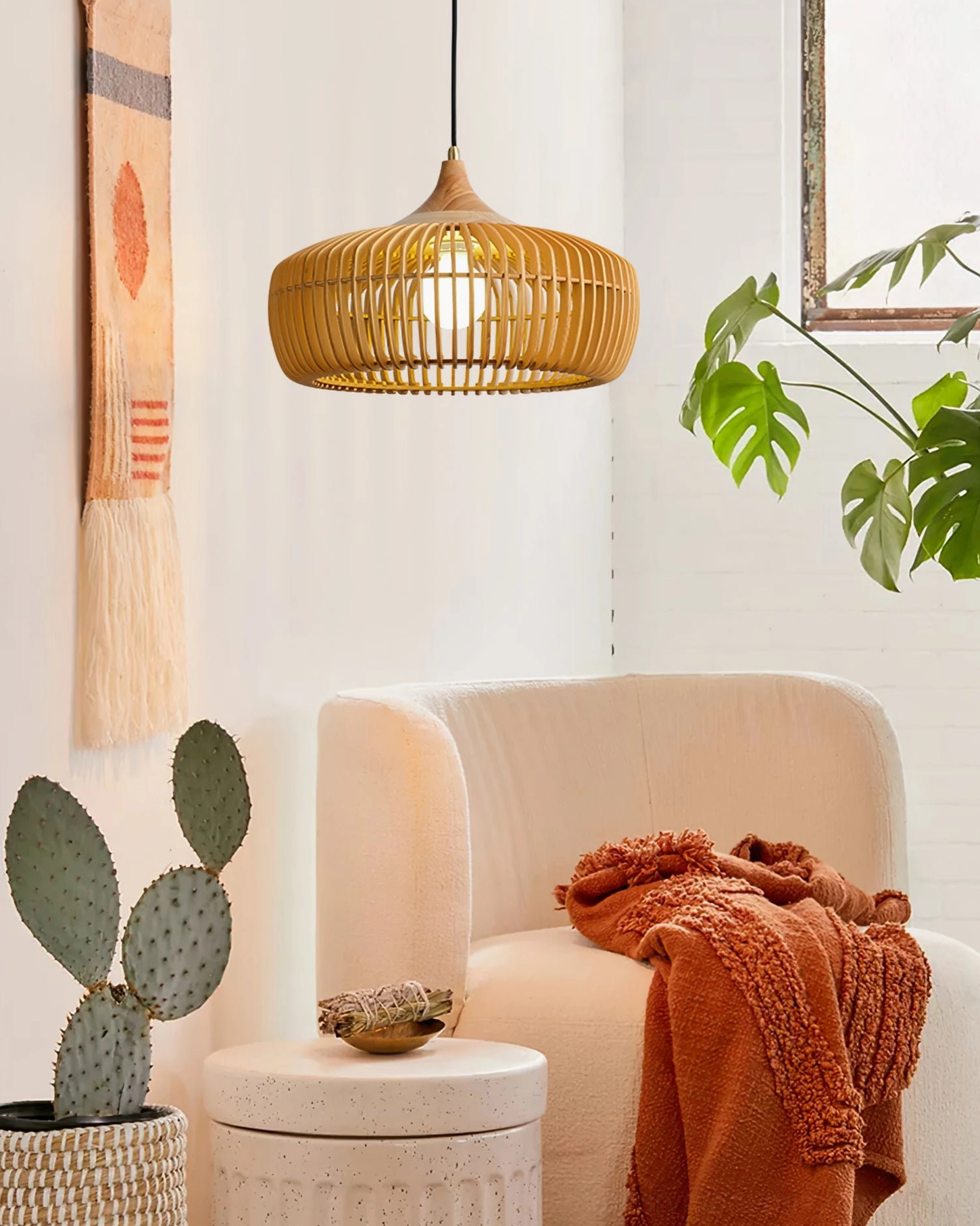 Pimms wooden pendant lamp installed in cozy bohemian living room creating warm ambient lighting with natural wood finish
