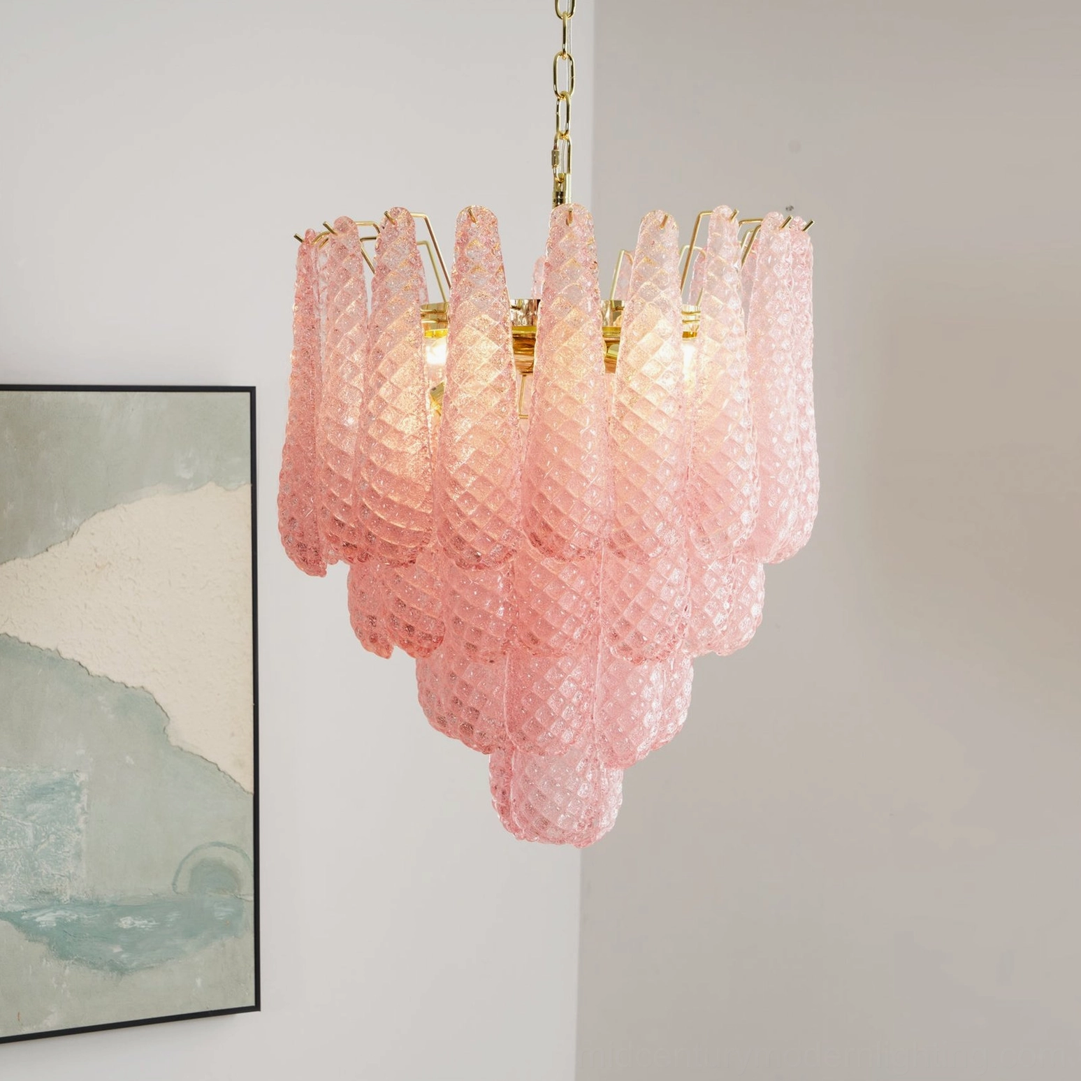 Pink hand-blown glass teardrop chandelier showing individual glass elements and texture