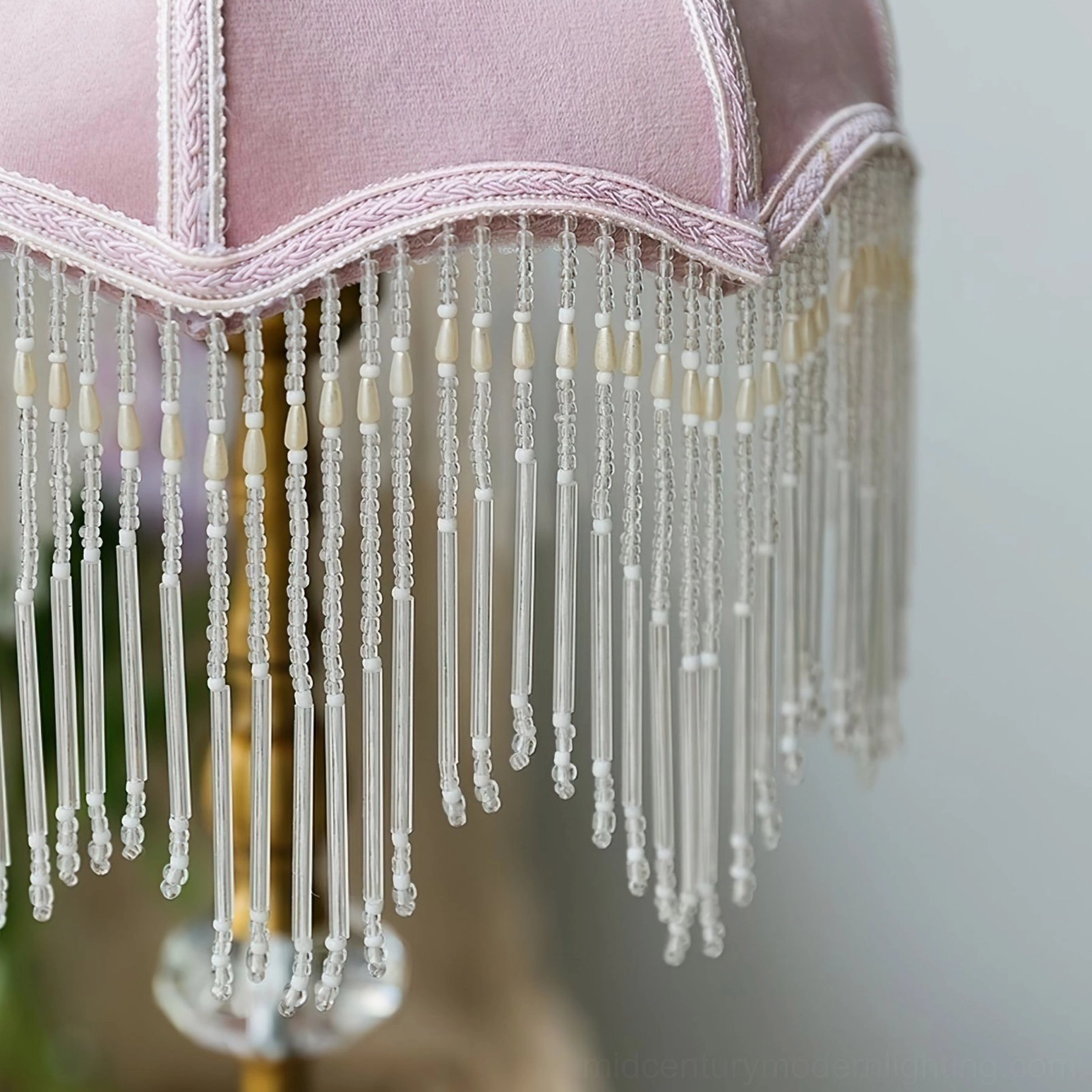 Pink and gold mid-century modern velvet table lamp with crystal base styling detail
