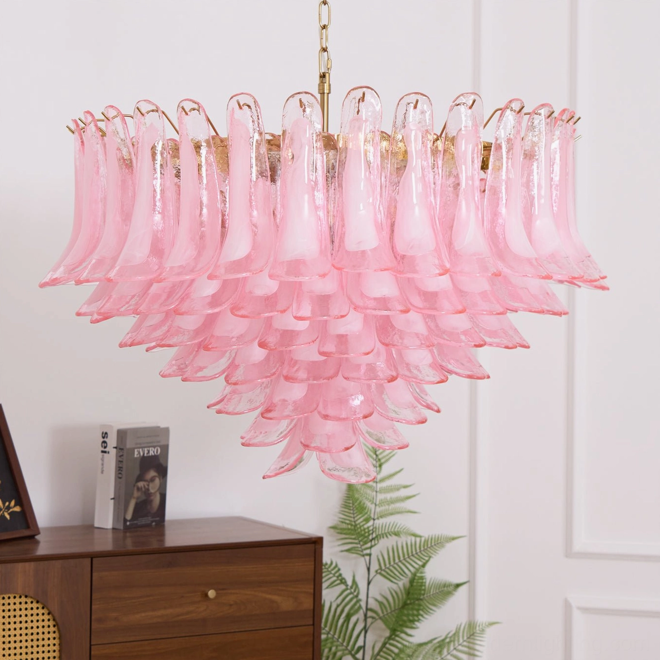 Pink Murano glass chandelier artistic studio photograph emphasizing delicate petal layers and soft romantic lighting