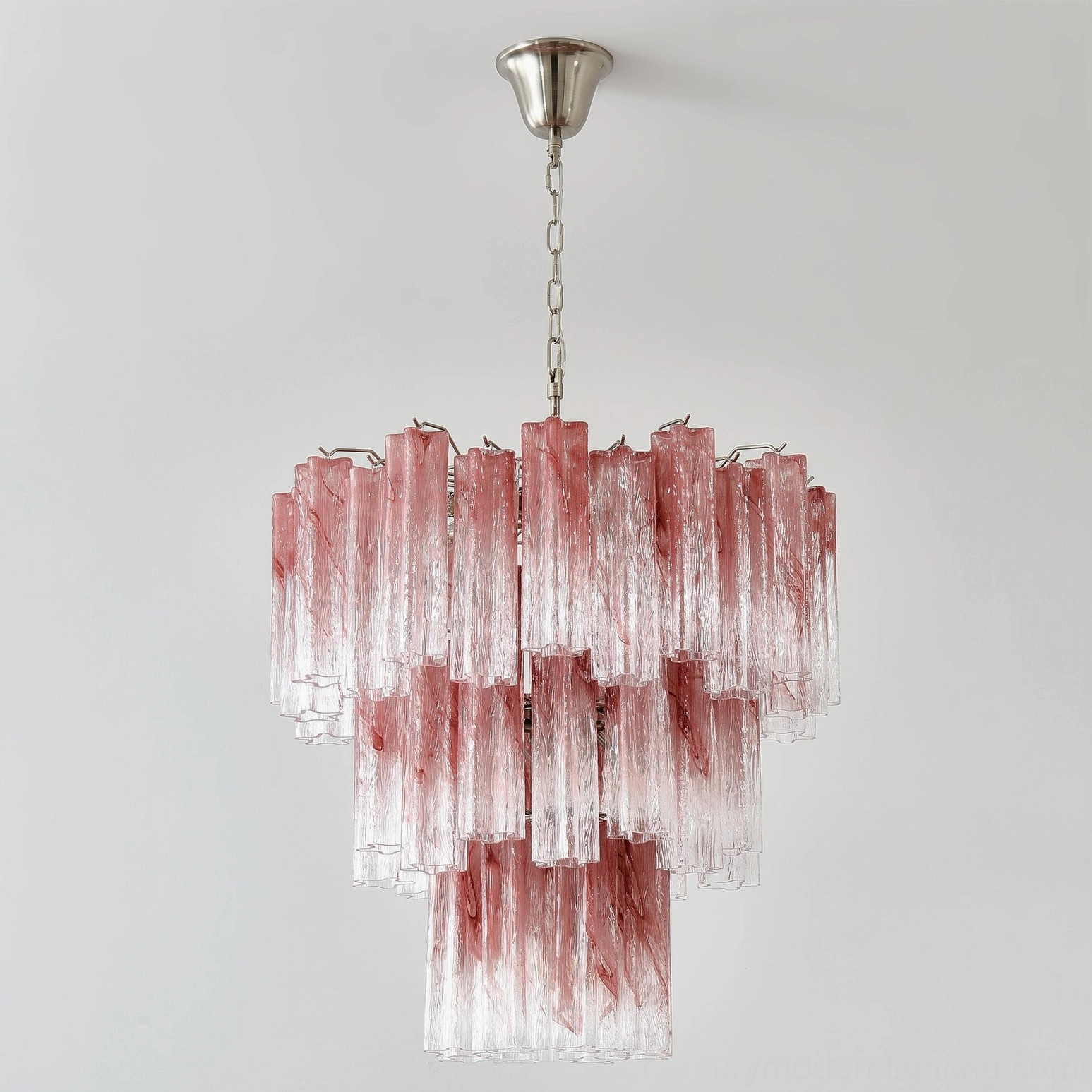 Close-up front shot of pink Murano tube chandelier showing detailed glass texture and chain suspension hardware