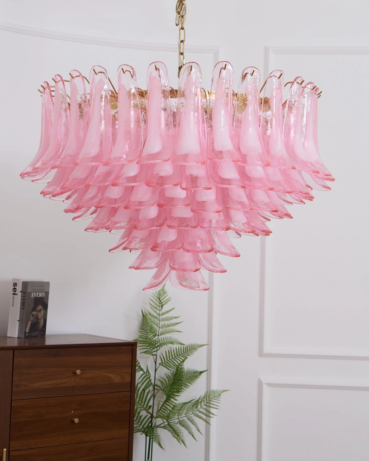 Pink Murano glass chandelier in luxury interior setting with refined furnishings showcasing premium aesthetic appeal
