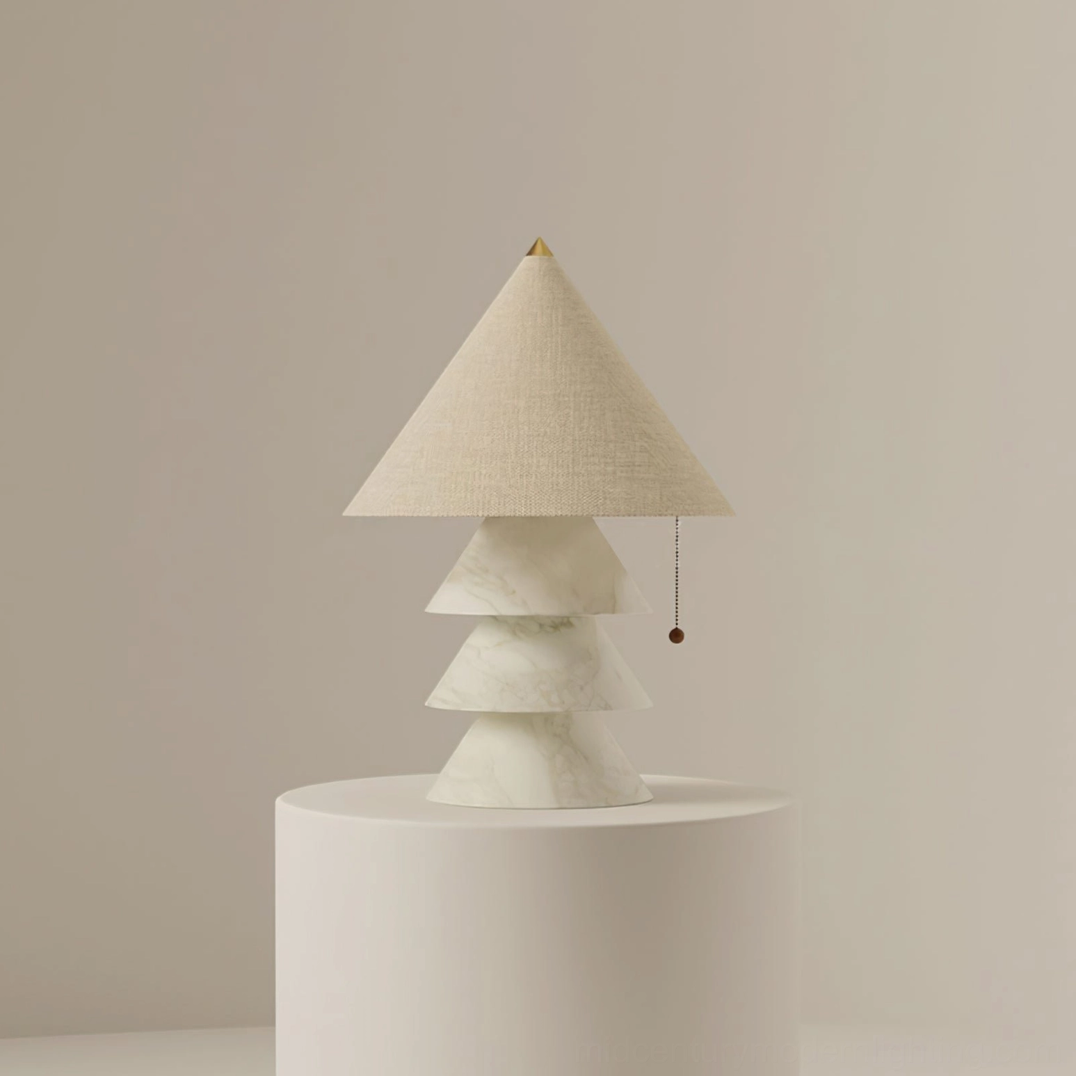 Pink marble pyramid table lamp in retail display space with decorative art and accessories