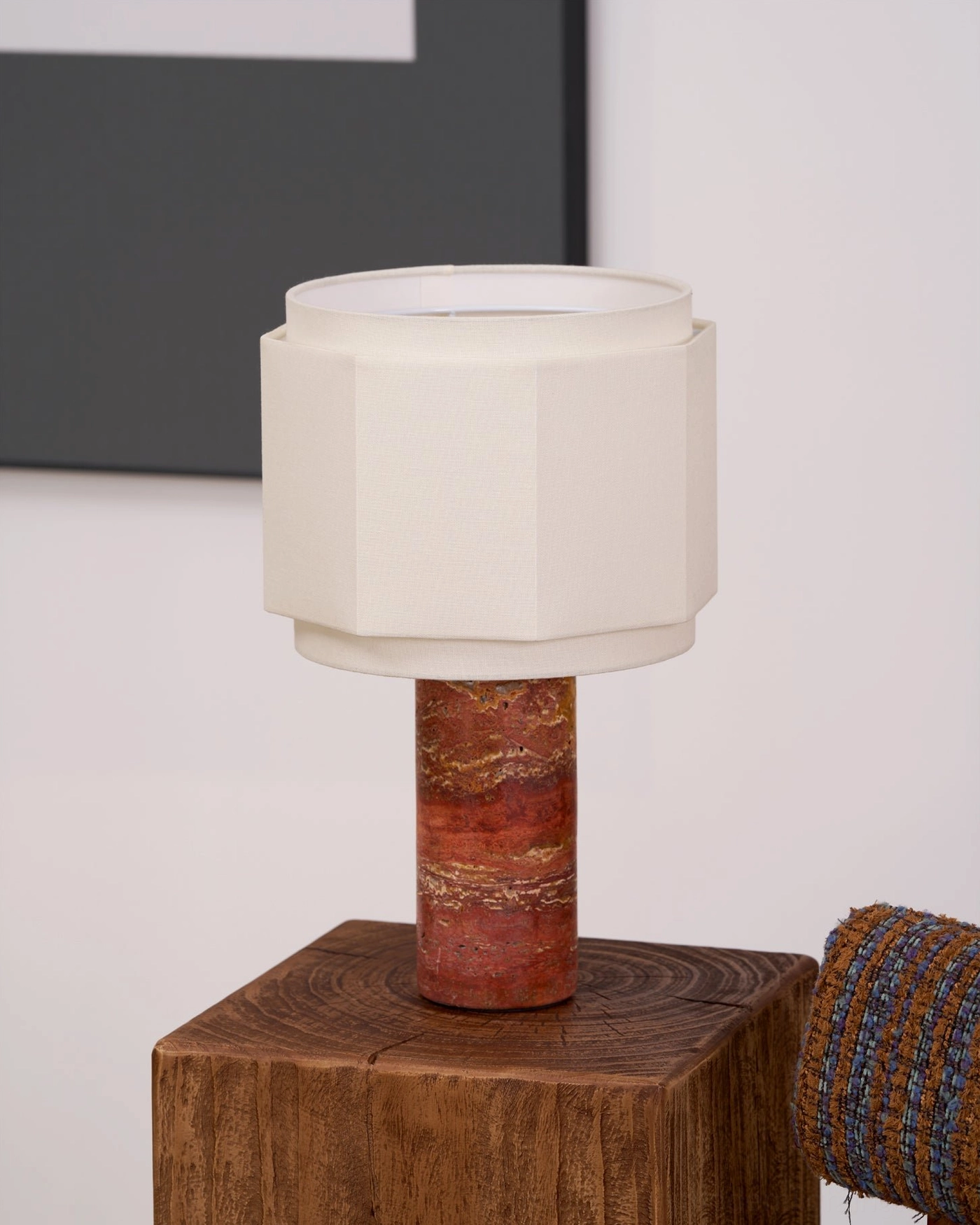 Pipito mid-century modern table lamp illuminated in contemporary bedroom nightstand arrangement