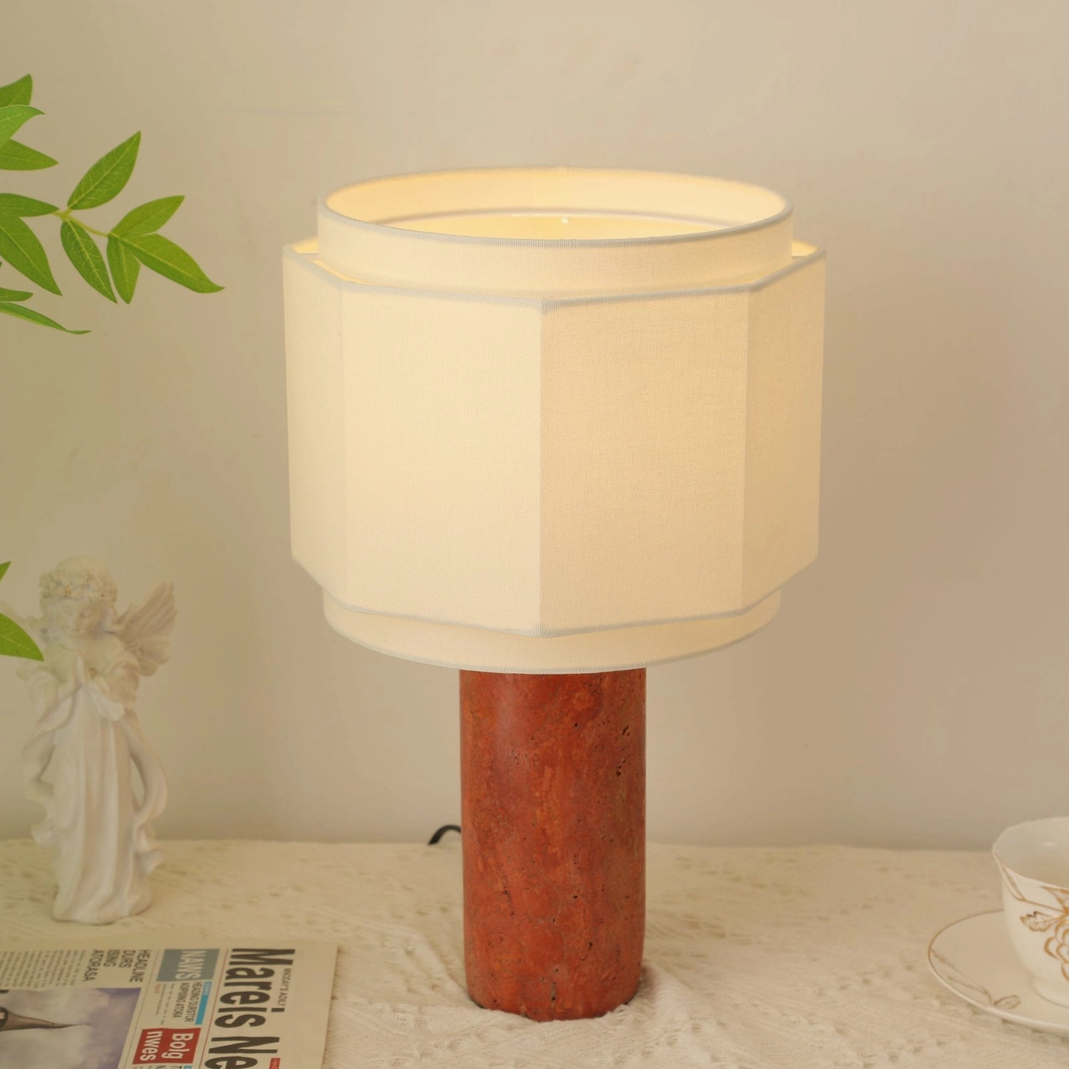 Pipito table lamp creating sculptural accent in minimalist interior design scheme