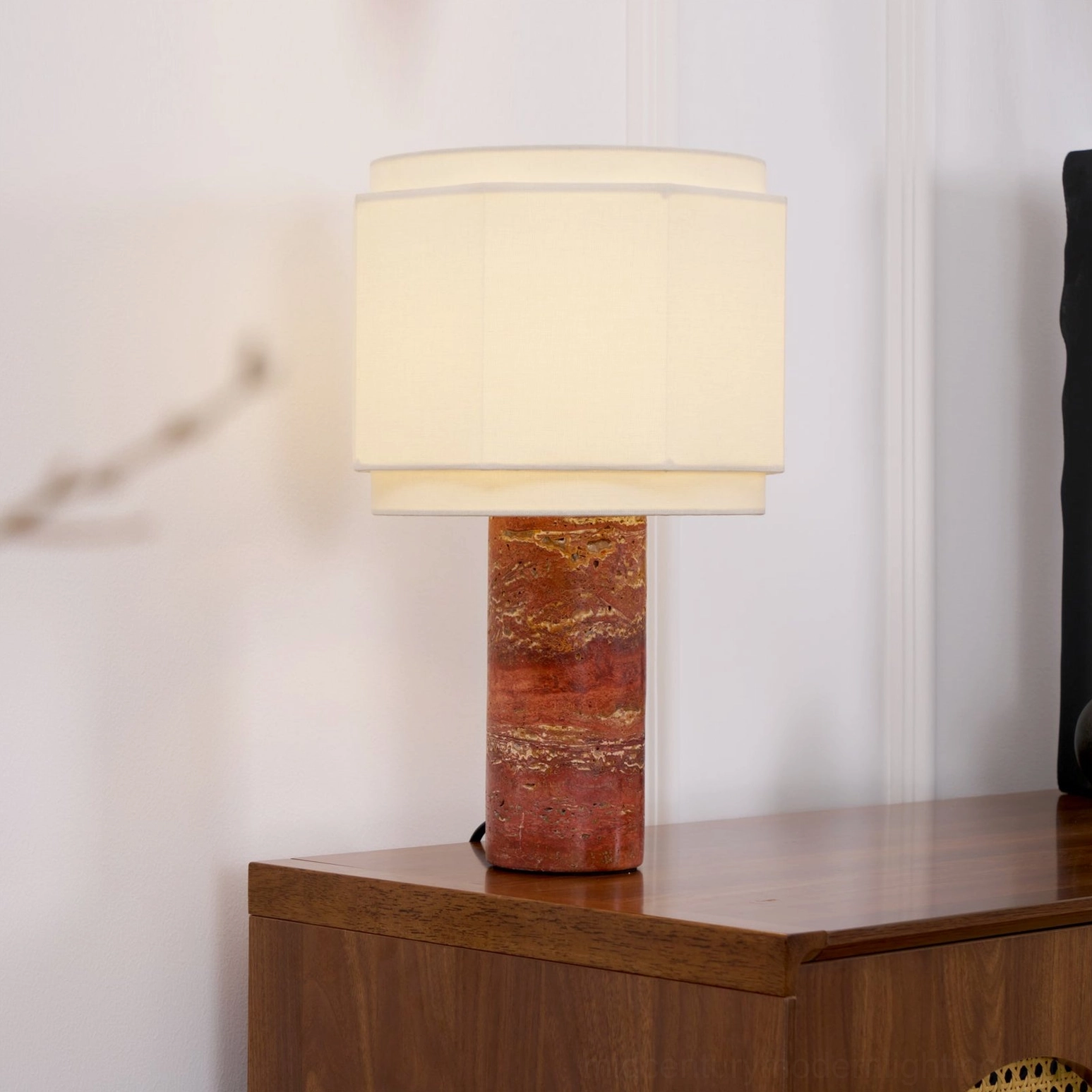 Pipito table lamp with geometric octagonal shade displayed on modern wooden dresser