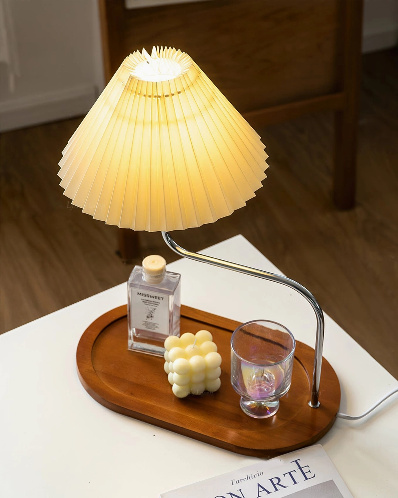 Flat front view of mid-century fabric table lamp with walnut tray and bedroom décor accessories