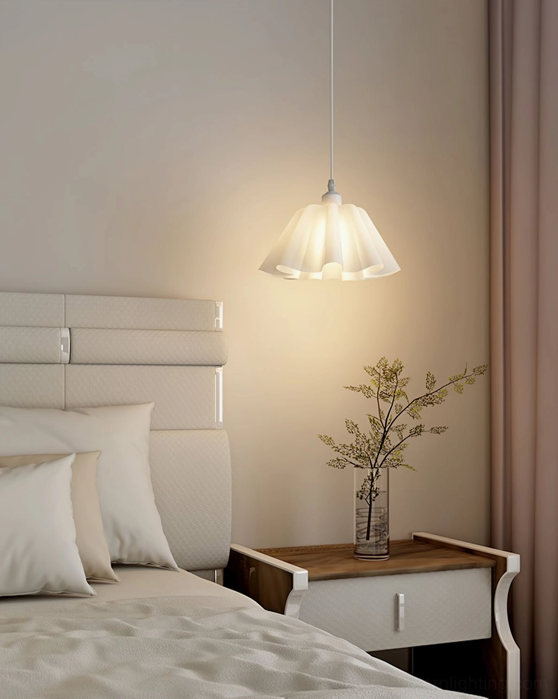 Pleated pendant light positioned in cozy neutral bedroom beside bed creating soft ambient bedroom lighting