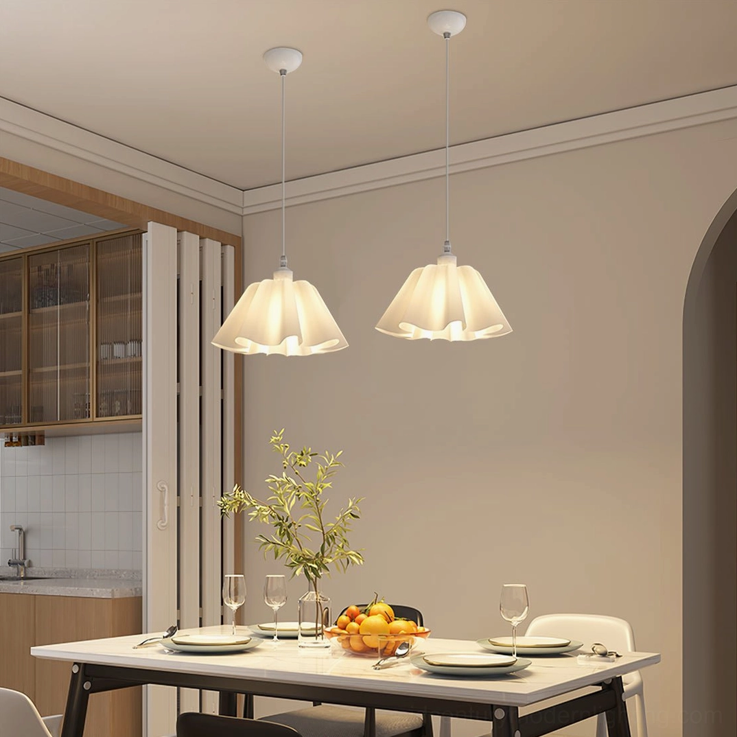 Three-quarter view of white pleated pendant light demonstrating form and light diffusion qualities