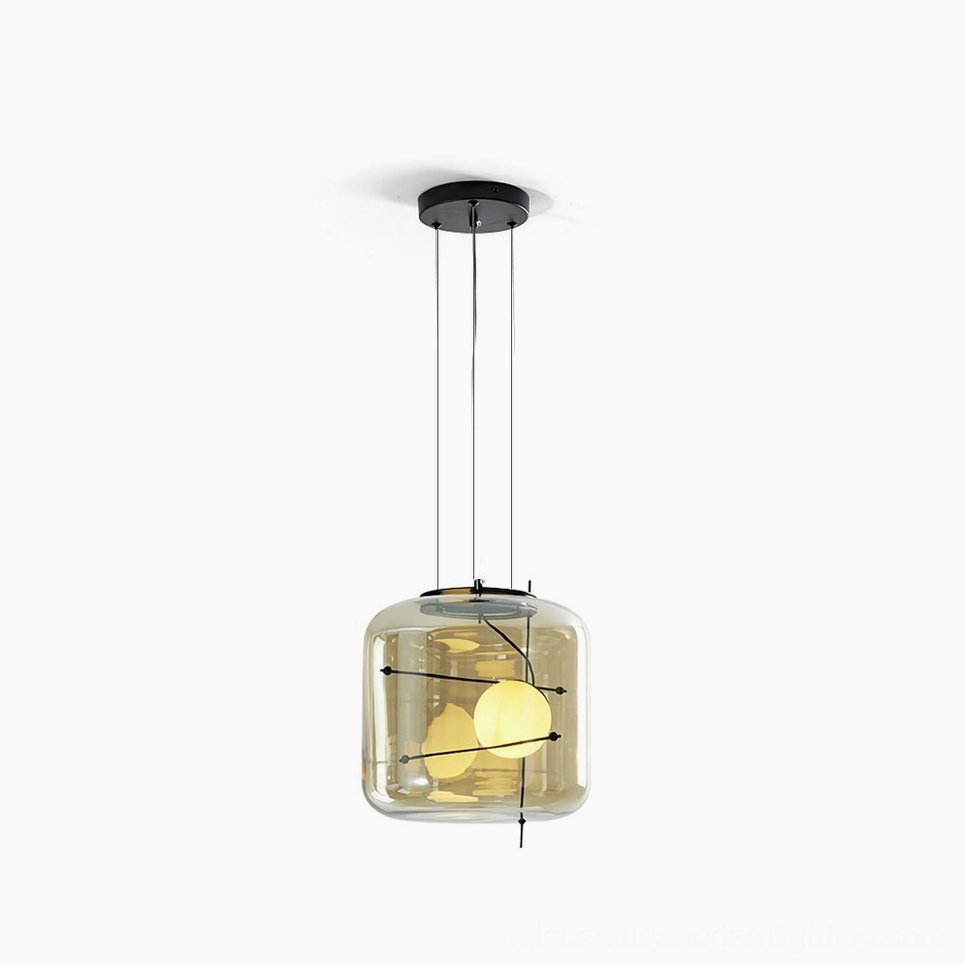 Plot pendant lamp with amber glass and black metal frame, front studio view showing dual warm bulbs