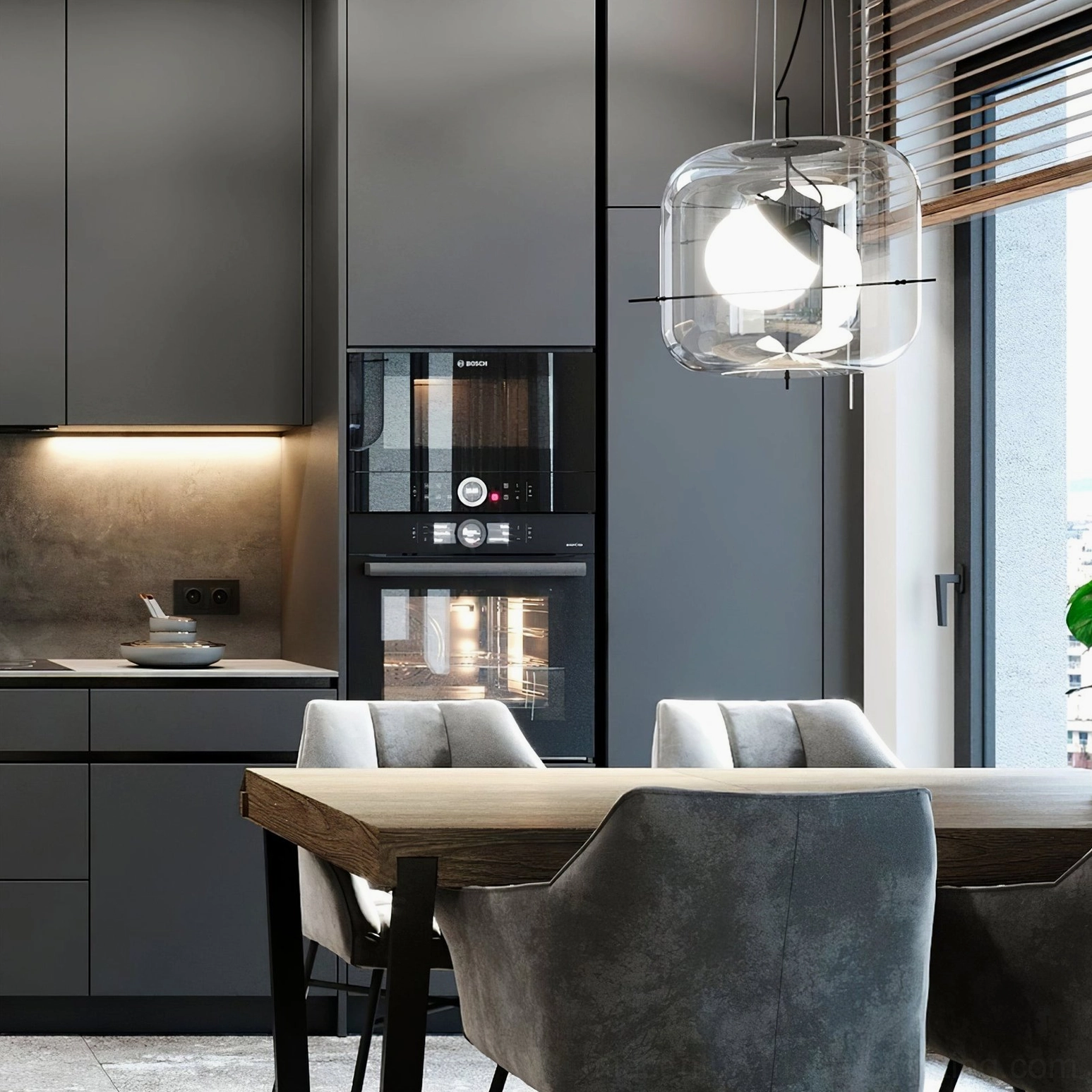 Clear glass Plot pendant lamp mounted above modern dining table in kitchen, Nordic minimalist setting