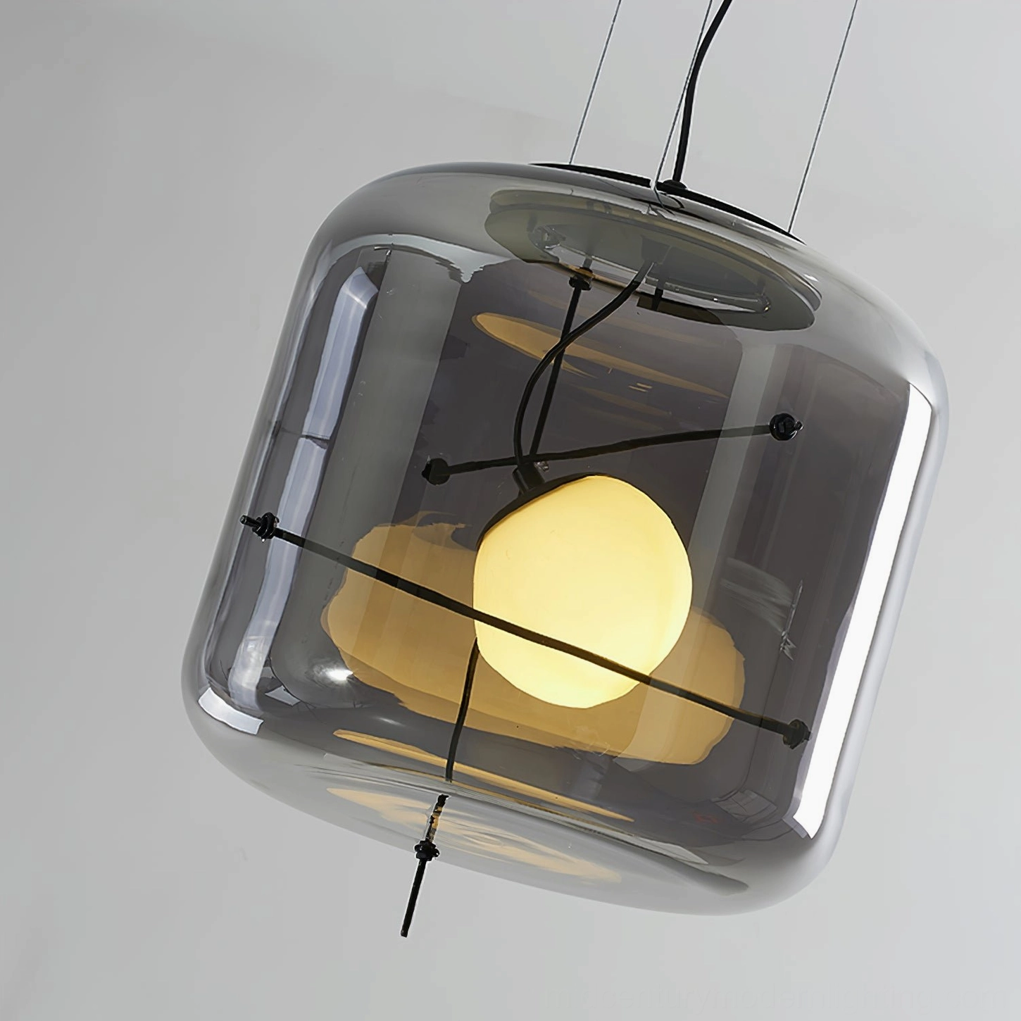 Plot cubic glass pendant lamp showcasing industrial minimalist design aesthetic