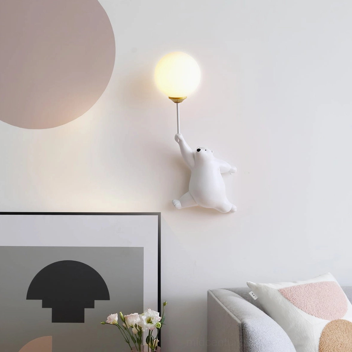Polar bear balloon wall lamp casting warm light in modern living room - contemporary home interior styling
