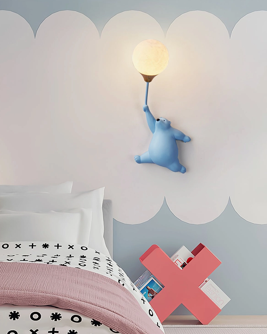 Pink polar bear balloon lamp beside upholstered pink headboard - warm ambient light in modern bedroom