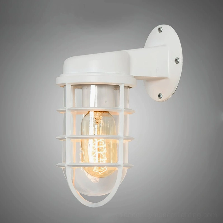 White industrial wall sconce with vintage marine cage design shown from side perspective
