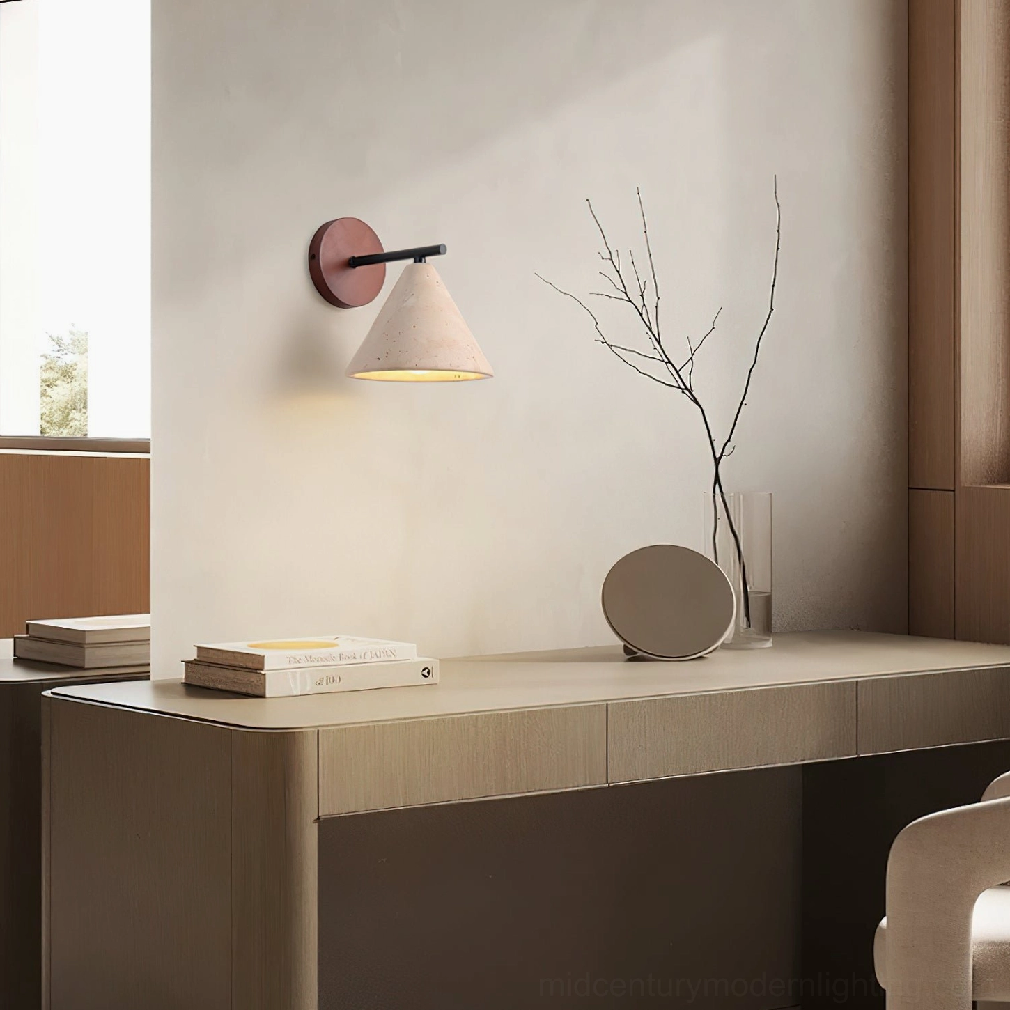 Possio wall sconce on console table display area, demonstrating quiet minimalist rustic home accent styling