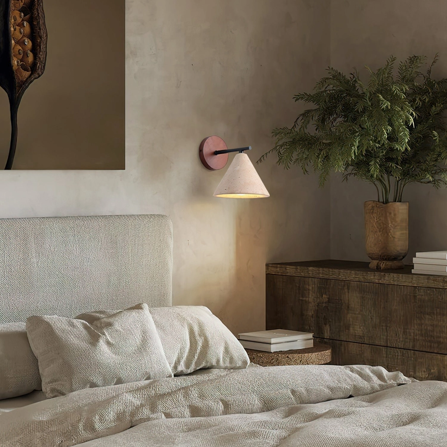 Possio travertine wall light in minimalist cozy bedroom, creating calm ambient lighting for relaxation space