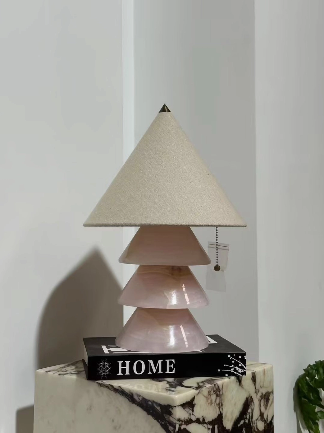 Pyramid marble table lamp with fabric shade close-up of base and hardware assembly