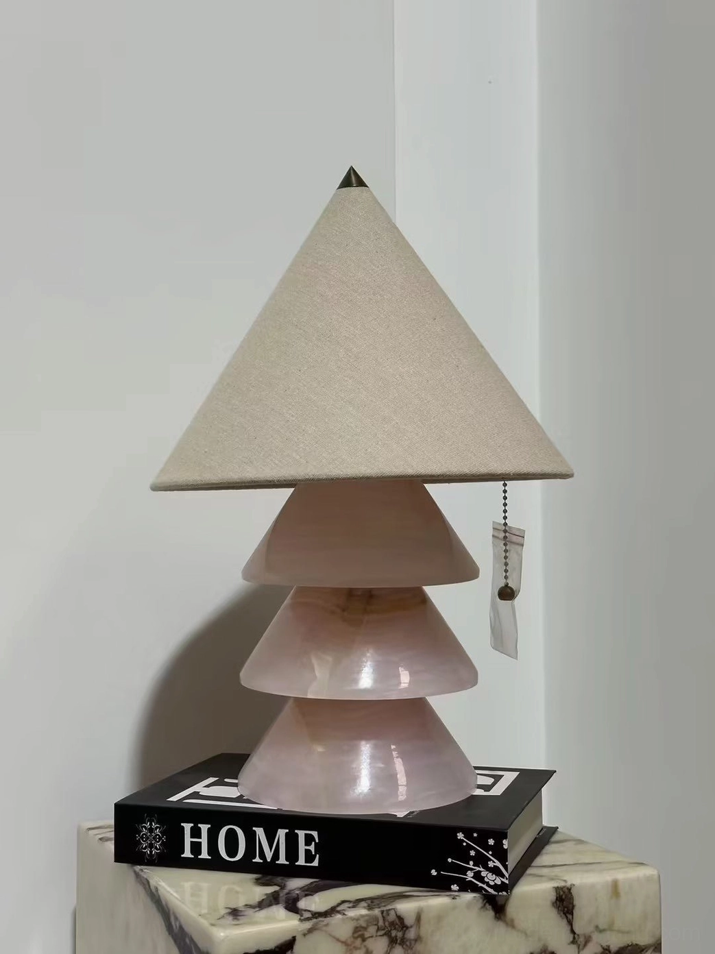 Pyramid marble table lamp full product shot showing proportions and light diffusion