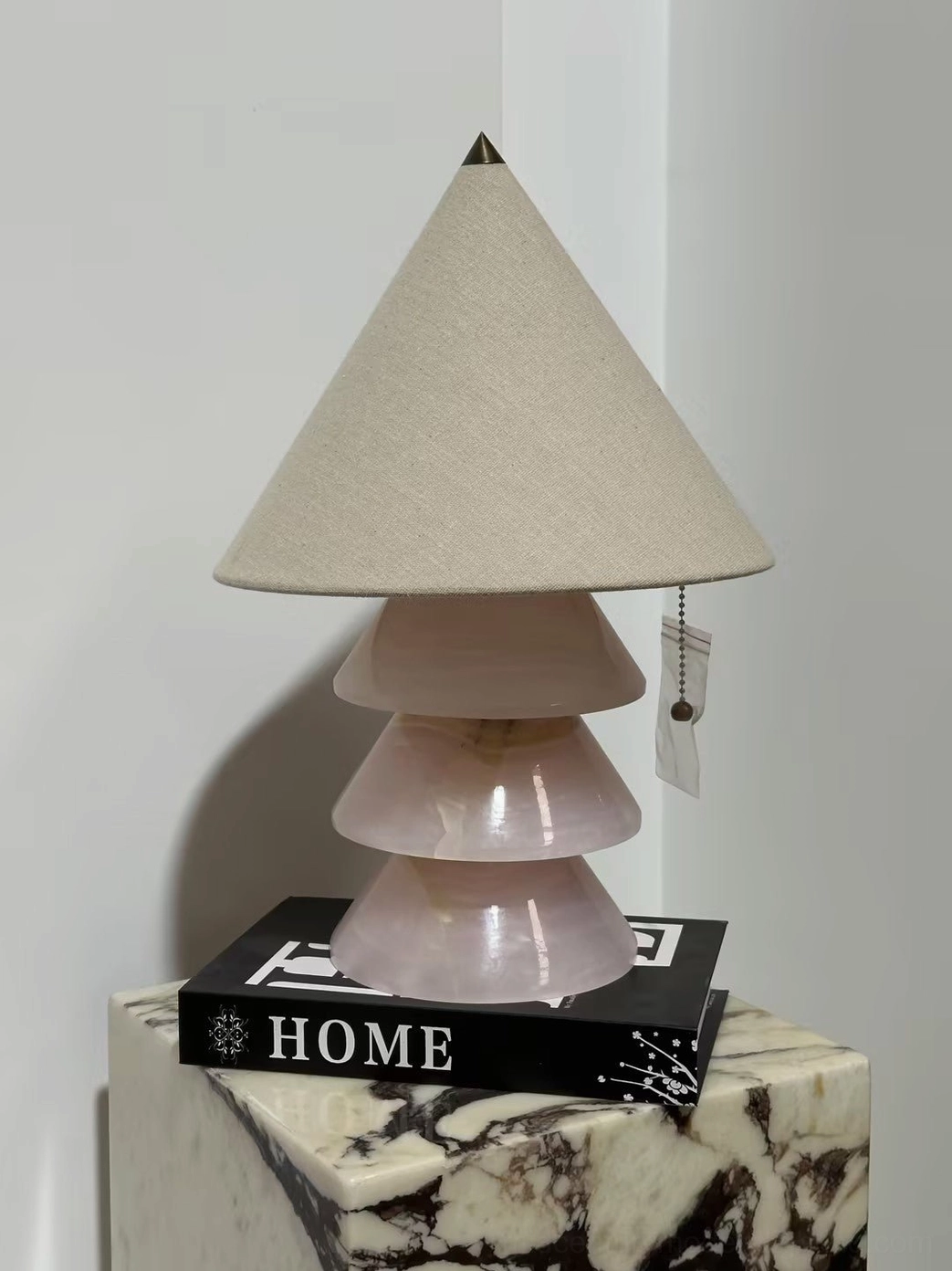 Mid-century modern pyramid marble table lamp profile view showing tiered geometry