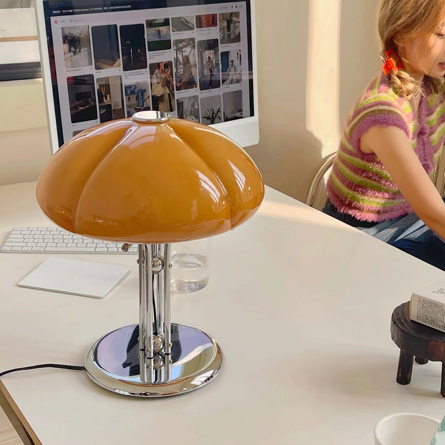 Quadrifoglio glass table lamp in home office workspace, retro mid-century modern design with polished chrome metalwork