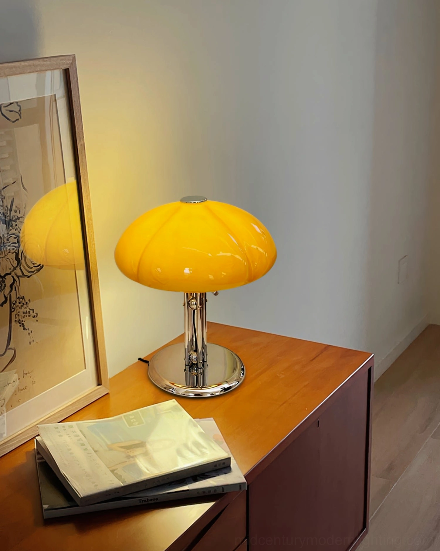 Quadrifoglio pumpkin-style table lamp overhead angle showing four-leaf clover glass shade form and warm glow