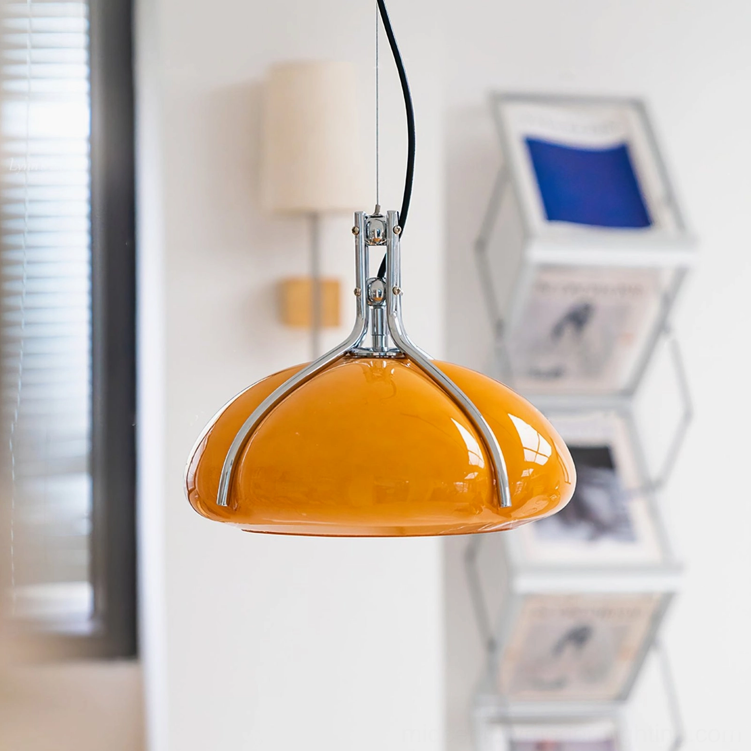Quadrifoglio amber pendant lamp in minimalist home corner with window styling