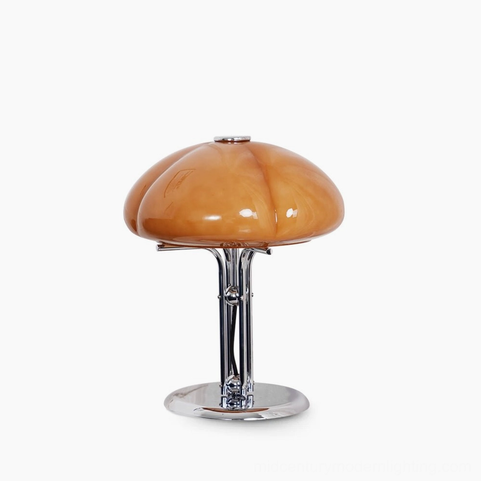 Quadrifoglio table lamp front face-on view, hand-shaped amber glass four-leaf clover silhouette with polished chrome base