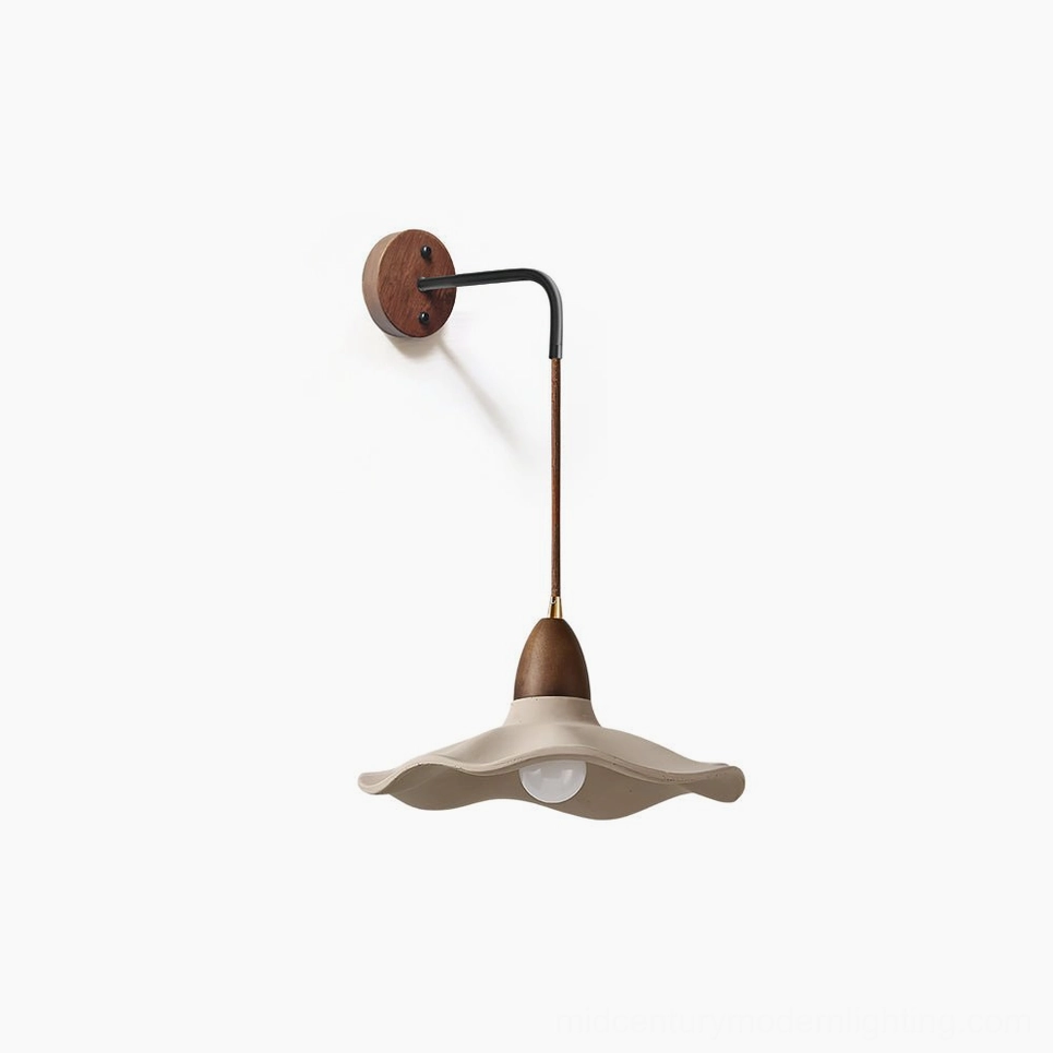 Radha contemporary wall lamp detail showing concrete texture and wood finish quality craftsmanship