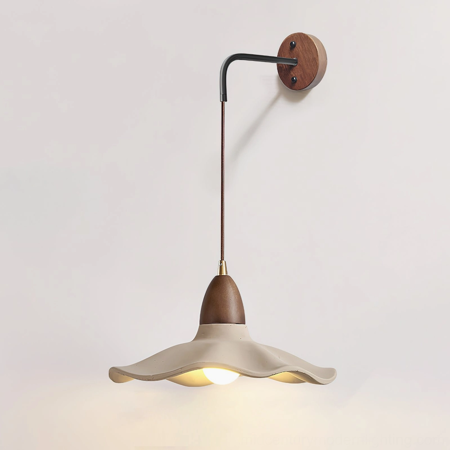 Radha wall lamp full product view showing complete sculptural design with wavy concrete shade and walnut accents