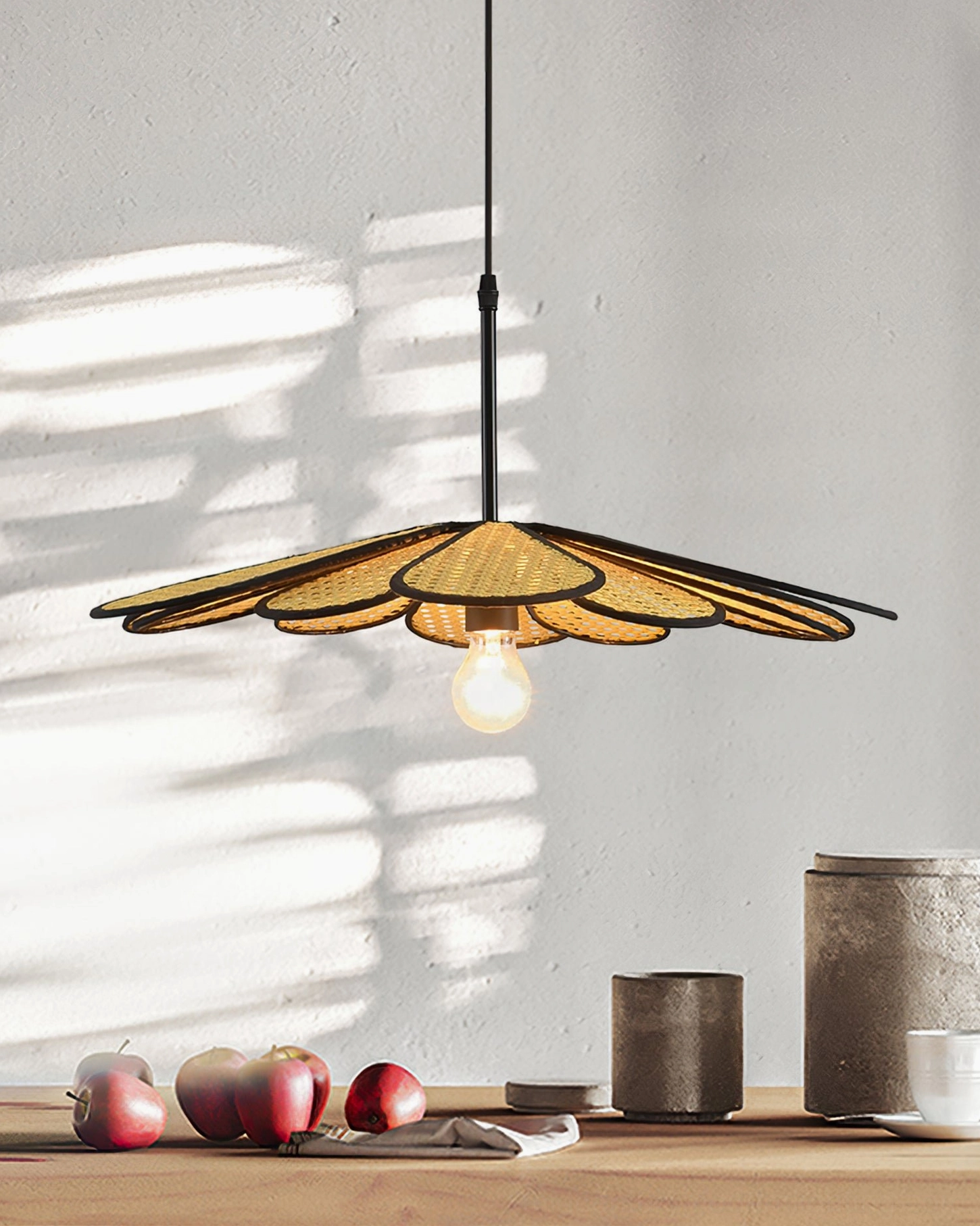 Contemporary living space featuring rattan flower pendant as statement lighting above seating arrangement
