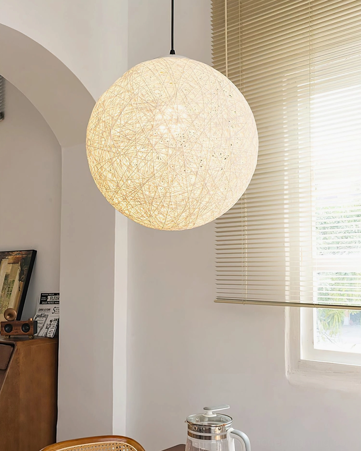 Wicker globe pendant lamp alternative angle natural rattan craftsmanship