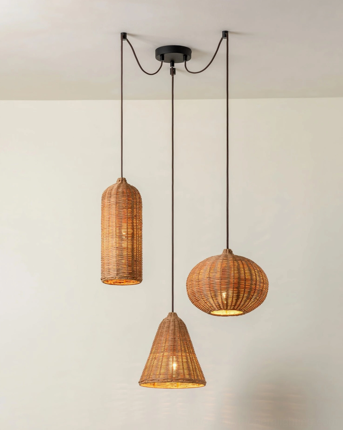 Hand-woven rattan pendant light installed in contemporary living space, demonstrating functional and aesthetic design integration