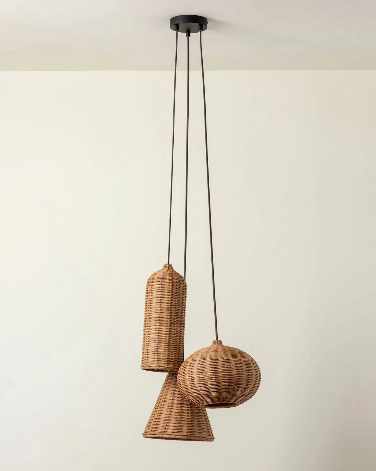 Hand-woven rattan pendant light shade with visible weave pattern and natural material finish detail
