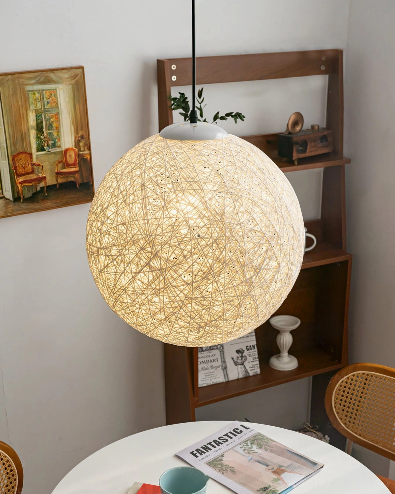 Wicker pendant lamp cozy reading corner wooden shelf bohemian rustic design