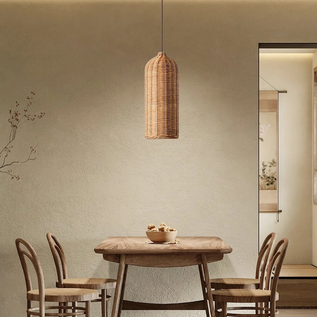 Single hand-woven rattan pendant shade with warm ambient glow effect, demonstrating light filtration through woven texture