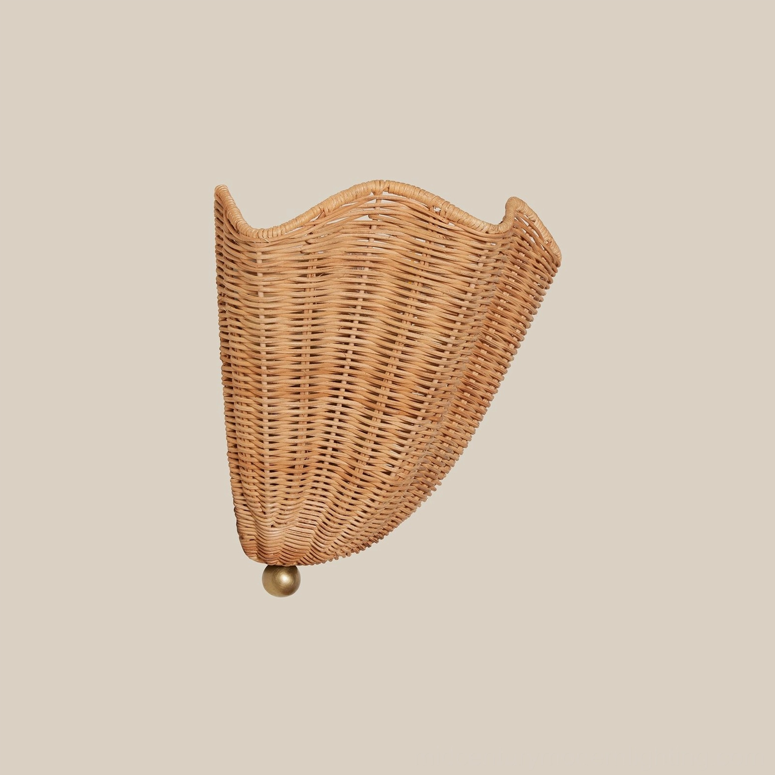 Sarasota handwoven natural rattan wall sconce detail showing scalloped weave pattern and light diffusion