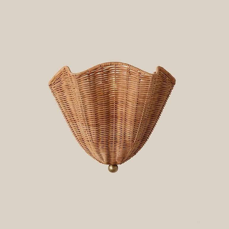 Sarasota rattan wall sconce close-up of hand-woven natural fiber construction and metal mounting bracket