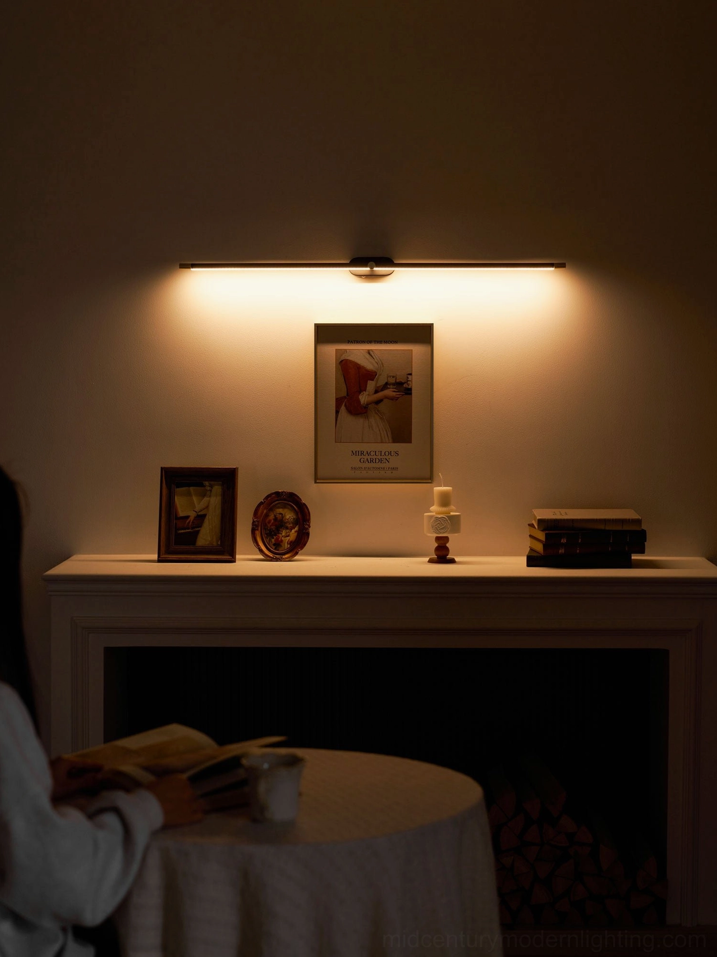 Rechargeable linear wall lamp mounted in contemporary hallway with clean minimalist design