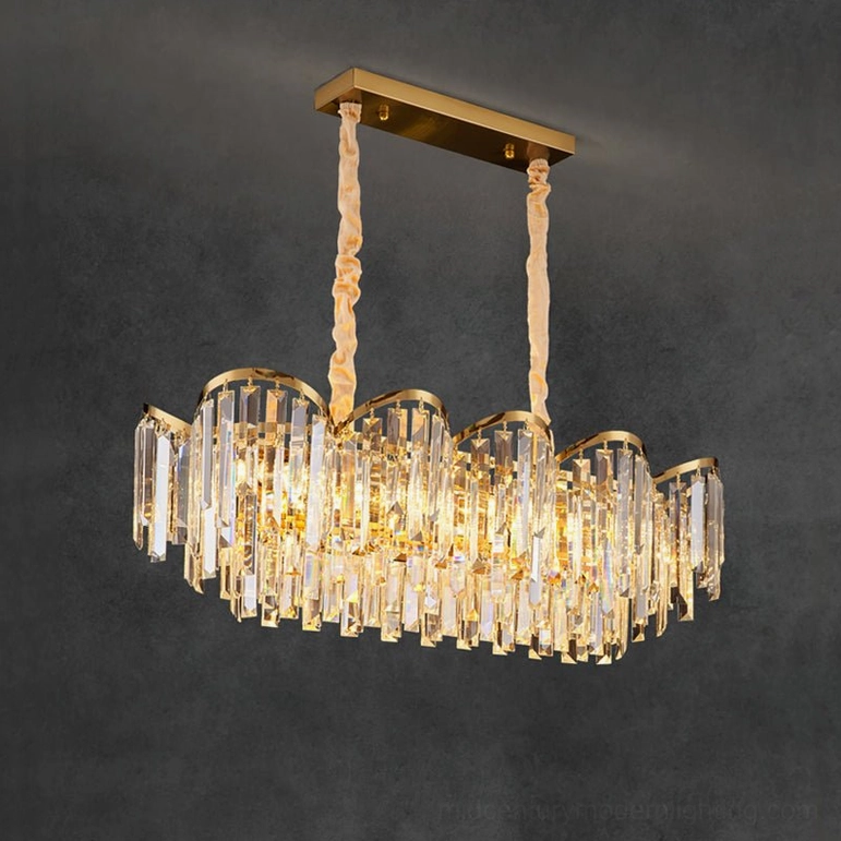 Rectangular crystal chandelier with extended gold frame in sophisticated interior space setting