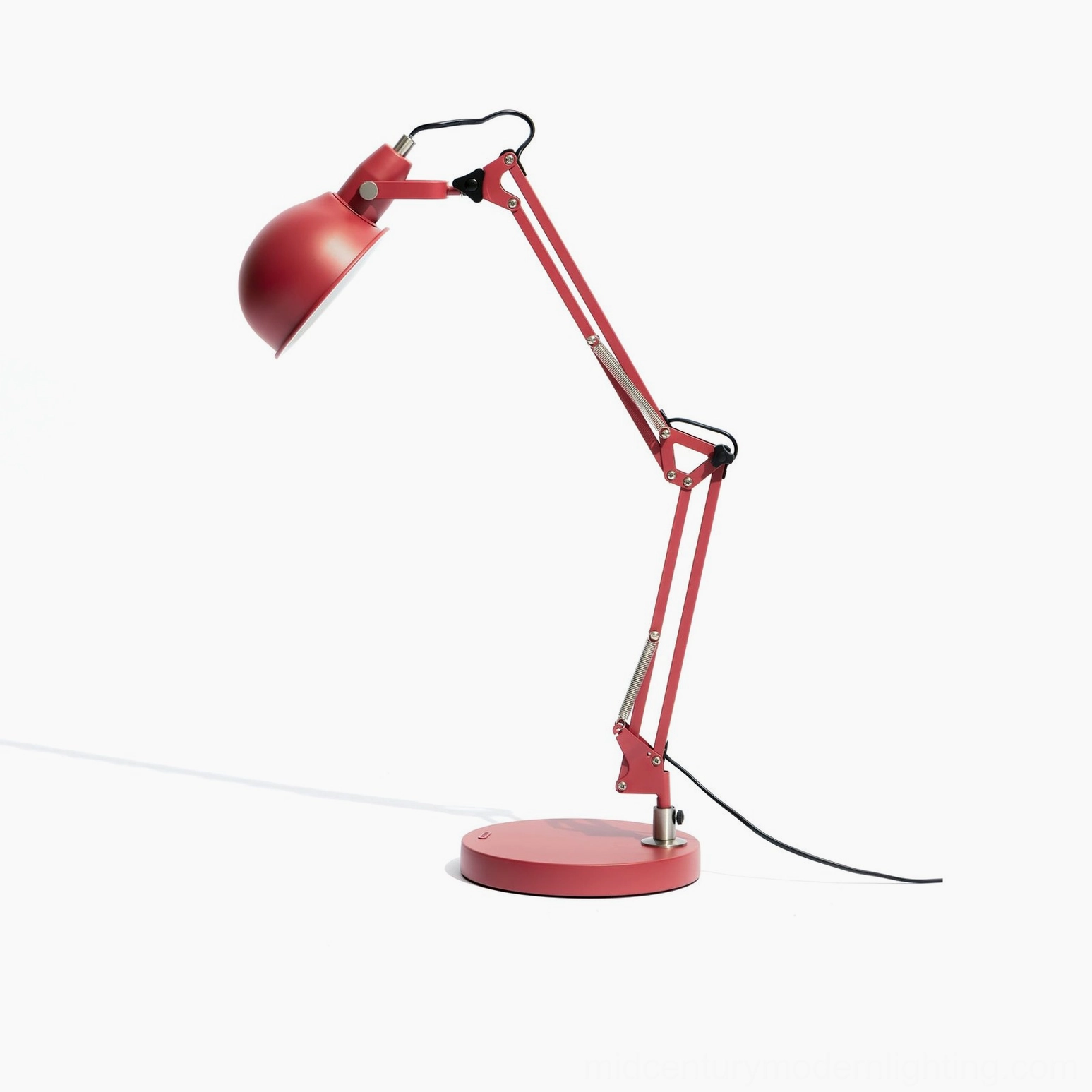 Red adjustable lamp showcasing vibrant vermillion finish and contemporary design sophistication