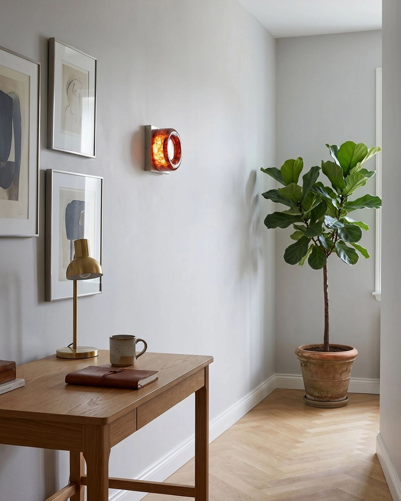 Warm LED integrated light output from red circular wall sconce in ambient bedroom environment